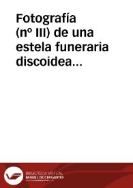 Portada:Fotografía (nº III) de una estela funeraria discoidea con inscripción y escena de un personaje sentado frente a una mesa, procedente de Lara de los Infantes.