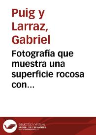 Portada:Fotografía que muestra una superficie rocosa con presuntas inscripciones.